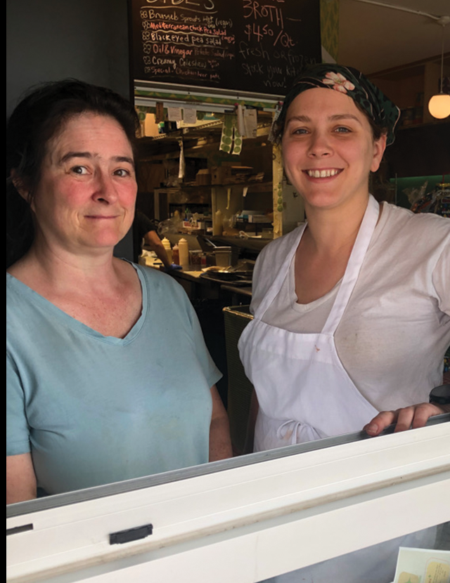 img src="NealsWindow.png" alt="meet the wonderful girls who run the window at Neals where there's no interior seating but there are rail stools and a few picnic tables >