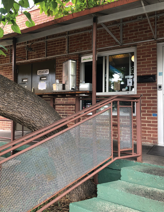 img src="Signage.pngneals-window.png" alt="This iron stair is all that tells the world of Carrboro and Chapel Hill herein is the lunch you've been looking for">